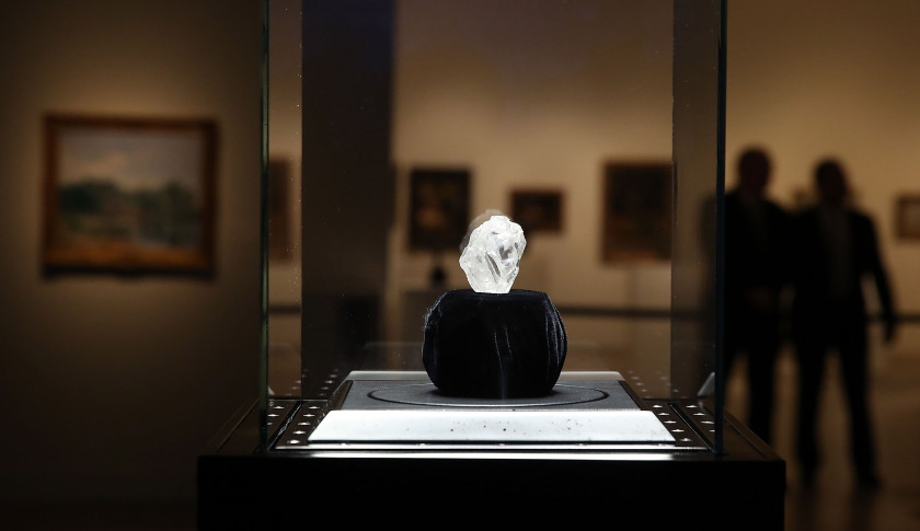 NEW YORK, NY - MAY 04: The 1109-carat rough Lesedi La Rona diamond, the biggest rough diamond discovered in more than a century, sits in a display case at Sotheby's on May 4, 2016 in New York City. The stone was found by Lucara Diamond Corp. last year at its Karowe mine in Botswana. The diamond, which is nearly the size of a tennis ball at 66.4 x 55 x 42mm and is believed to be about 2.5 billion to 3 billion years old, was named "Our Light" in the local Tswana language. Lesedi La Rona will be offered at auction in London on June 29 and be on display at Sotheby's New York. The diamond could sell for $70 million or more. (Photo by Spencer Platt/Getty Images)